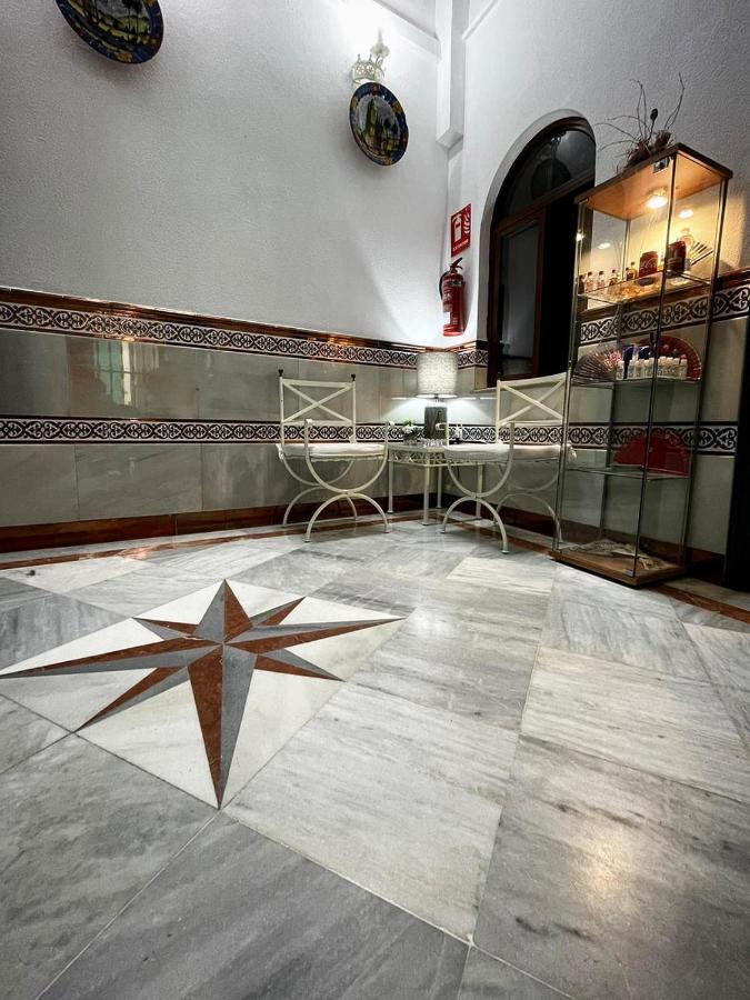 Hostal Paco'S Seville Exterior photo Marble floor