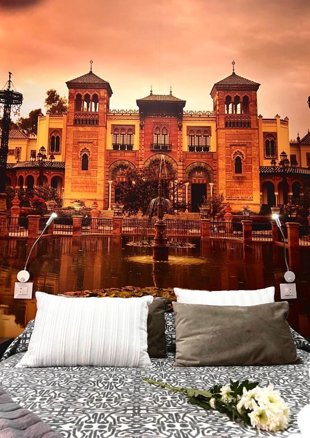 Hostal Paco'S Seville Exterior photo The hotel's rooms are decorated with murals of the Alhambra.